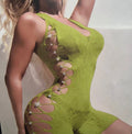 Green lace bodysuit with cut-out design and rhinestones on a plain background