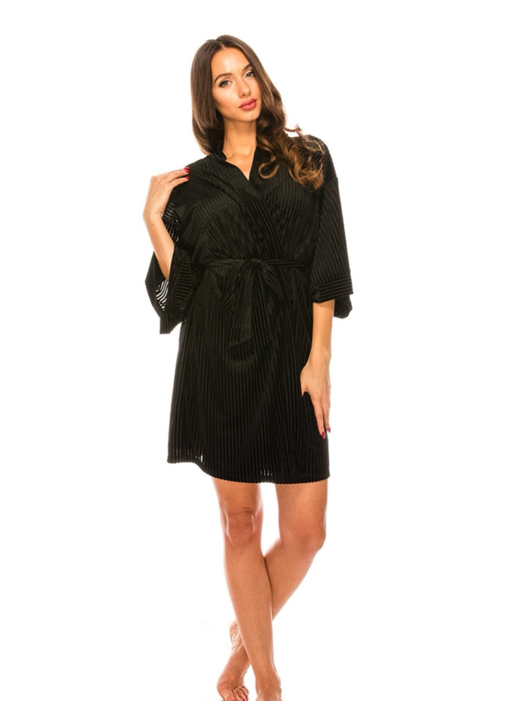 Woman wearing a black robe on a white background